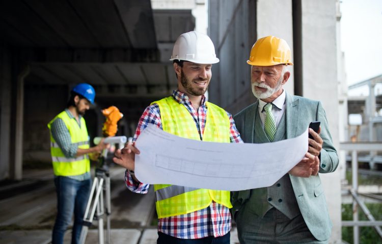 construction-engineer-with-foreman-worker-checking-construction-site.jpg